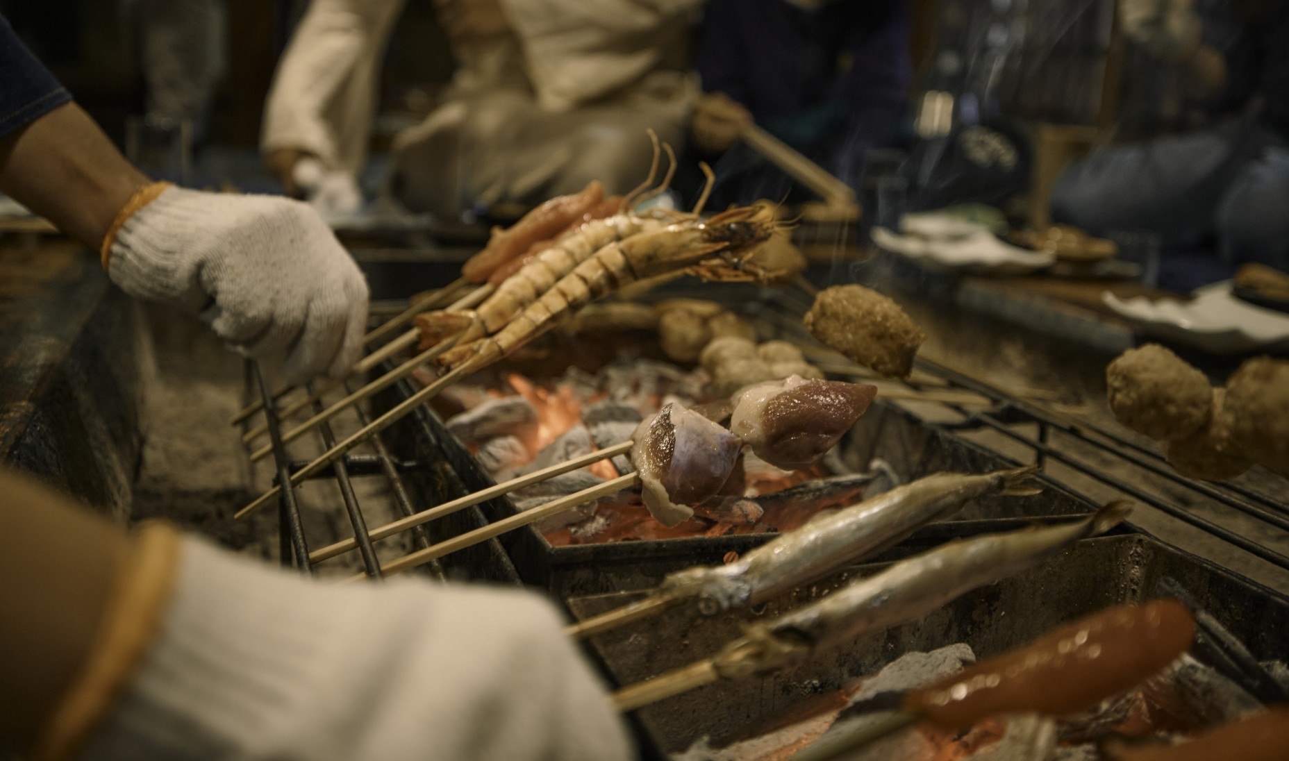 Japanese BBQ and local dishes on a table