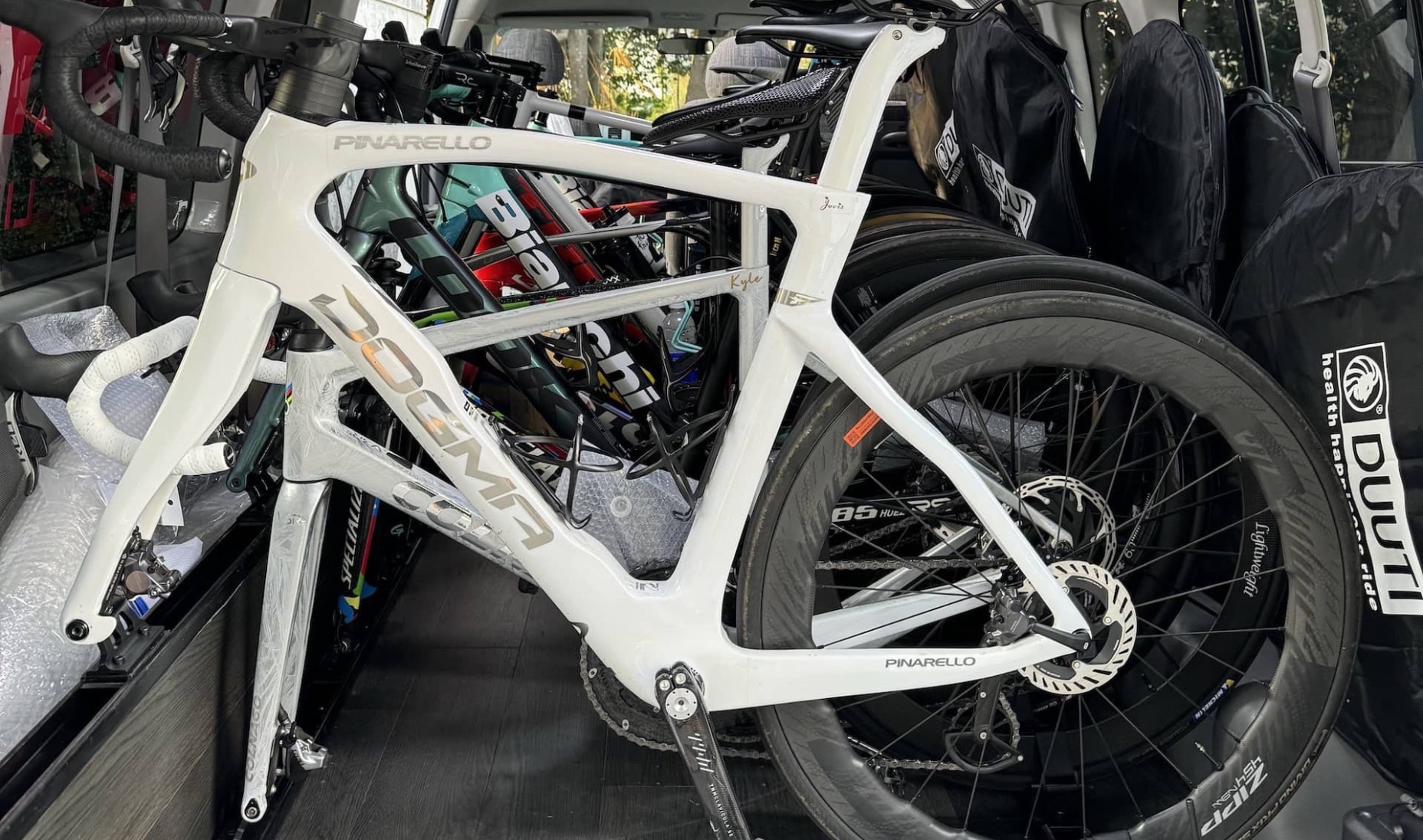 Bicycles and equipment inside a support vehicle